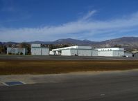 Santa Paula Airport (SZP) - Newer Hangars, Topa Topa Mnts. in background-6,244 feet, Hines Peak 6,704 feet elevation, nearer to right-Santa Paula Ridge 2,817 feet elevation - by Doug Robertson