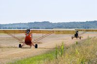 Brodhead Airport (C37) - Two Piets taxi to runway 09 - by Mike Madrid