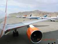 Kabul International Airport - Kabul Civil ramp from  L1 door of N619UA - by John J. Boling