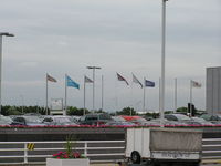 London Heathrow Airport, London, England United Kingdom (EGLL) - Airline Flags outside Terminal 4 at Heathrow - by John J. Boling