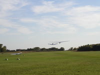 Faribault Municipal Airport (FBL) - 312RA towing 6156J off of Runway 20 at Faribault. - by Mitch Sando