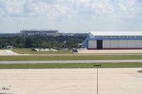 Tampa International Airport (TPA) - hangar with Raymond James Stadium (Tampa Bay Bucs) - by Florida Metal