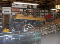 Santa Paula Airport (SZP) - DeHavilland Gipsy Moth and Tiger Moth parts in David Watson Museum Hangar - by Doug Robertson