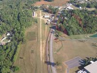 Darr Field Airport (NC03) - crossing overhead the field - by Tom Cooke