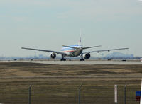 Dallas/fort Worth International Airport (DFW) - American Airlines 757 in position and holding 17L - Notice the new Dallas Cowboys Staduim under construction 15 miles south, in Arlington, under the right wing - by Zane Adams