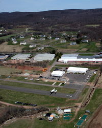 Ellington Airport (7B9) - Caravan landing at Ellington - by Dave G