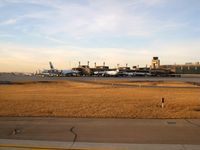 Calgary International Airport - YYC - A view of Concourse B & C used for all Air Canada and International flights.  In this picture are two AC 333 bound for LHR and FRA - by CdnAvSpotter