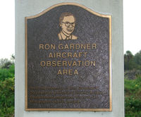 Fort Lauderdale/hollywood International Airport (FLL) - Aviation enthusiasts and photographers who visit the wonderful viewing area at the western threshold should take a moment to observe the plaque , dedicated to Ron Gardner, after whom the observation area is named - by Terry Fletcher