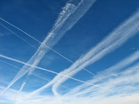 Harry Reid International Airport (LAS) - More of those crazy contrails... - by Brad Campbell