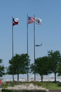 Fort Worth Alliance Airport (AFW) - Flags at the entrance to Alliance Ft. Worth - by Zane Adams