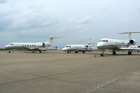 Arlington Municipal Airport (gky) - Three Lockheed Martin jets on the ramp  - by Zane Adams