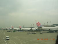 Taiwan Taoyuan International Airport (formerly Chiang Kai-Shek International Airport) - China Airlines Ramp at Taipei - by John J. Boling