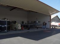 Santa Paula Airport (SZP) - Legendary Aircraft LLC, 70% scale TF-51, P-51D MUSTANGS in Area 51. Composite molded construction with V-8 Corvette engines. N151RK shown in hangar 1 of 2. Ed Hullinger, Principal. See: www.LegendaryAircraft.com - by Doug Robertson