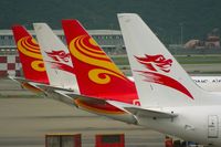 Hong Kong International Airport, Hong Kong Hong Kong (VHHH) - Colorful tails from Hong Kong Express 737s - by Michel Teiten ( www.mablehome.com )