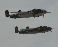 Nellis Afb Airport (LSV) - Mitchells over Nellis AFB NV - by J.G. Handelman