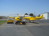 Santa Paula Airport (SZP) -  Yellow Toys for Big Boys. The bike is a one-off designed and built by the owner. - by Doug Robertson