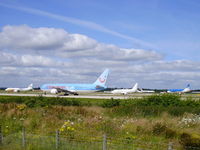 Manchester Airport, Manchester, England United Kingdom (EGCC) - Busy day on RW 23L - by Chris Hall
