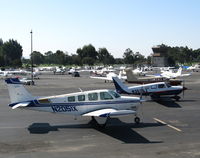 Palo Alto Arpt Of Santa Clara Co Airport (pao) - N2051X/N3946J/N39944 running-up engines while tower lets stream of Cessnas come home - by Steve Nation