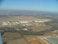 Denton Municipal Airport (DTO) - Looking midfield while left downwind for Rwy 17 - by B.Pine