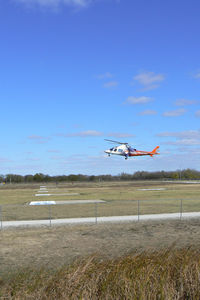 Bell Training Facility Heliport (3XS7) - Texas Motor Speedway Heliport - CareFlite N144CF landing during the Boy Scout Camporee - by Zane Adams
