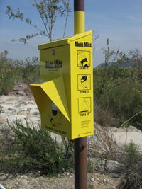 Santa Paula Airport (SZP) - Closeup. 'Mutt Mitt' Doggy-Doo cleanup-one of several new installations around the airport. Grab it. Turn it. Toss it. - by Doug Robertson