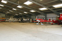 Lashenden/Headcorn Airport, Maidstone, England United Kingdom (EGKH) - Inside the main hangar - view three. - by Martin Browne