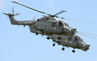 RAF Cosford Airport, Albrighton, England United Kingdom (EGWC) - Royal Navy Lynx display team at the Cosford Air Show - by Chris Hall