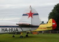 Popham Airfield Airport, Popham, England United Kingdom (EGHP) - YAK 18T'S OUTSIDE THE CLUB HOUSE, UNFORTUNATELY HA-HUA ALWAYS HAS THE COVERS ON WHEN I'M AT POPHAM - by BIKE PILOT