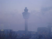 Amsterdam Schiphol Airport, Haarlemmermeer, near Amsterdam Netherlands (AMS) - Schiphol Airport with Fog - by Caecilia van der Bos