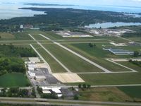 Carl R Keller Field Airport (PCW) - Looking NE down RWY 36, Put-In-Bay Island beyond - by Bob Simmermon