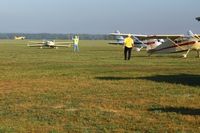 Grimes Field Airport (i74) - Arrivals at MERFI 2009. - by Bob Simmermon
