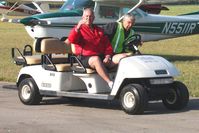 Grimes Field Airport (I74) - Carl & Gordon maintaining order and offering transportation at MERFI 2009 - by Bob Simmermon