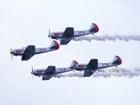 Hawarden Airport, Chester, England United Kingdom (EGNR) - The Yakolovs display team displaying at the Airbus families day - by Chris Hall