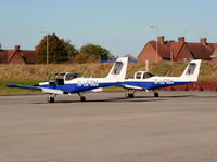 Liverpool John Lennon Airport, Liverpool, England United Kingdom (EGGP) - G-LFSM and G-LFSH Piper PA-38-112 of the Liverpool Flying School - by Chris Hall