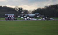 Lasham Airfield Airport, Basingstoke, England United Kingdom (EGHL) - Gliding at Lasham. Double Decker bus used as signals caravan. - by moxy
