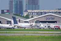 Toronto City Centre Airport, Toronto, Ontario Canada (YTZ) - Photo taken on board a ferry to Toronto Islands - by Tomas Milosch