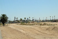 Calexico International Airport (CXL) - Mexico as seen from the airport parking lot looking South. - by Marty Kusch