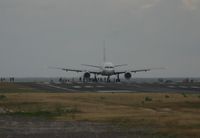 Princess Juliana International Airport, Philipsburg, Sint Maarten Netherlands Antilles (TNCM) - Continental at the tresh hold on a very dark day - by Daniel Jef