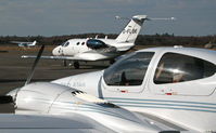 Blackbushe Airport, Camberley, England United Kingdom (EGLK) - VIEW FROM THE EASTERN BOUNDARY FENCE. DA42 G-CDXK, MUSTANG G-FLBK AND REIMS CESSNA F150M G-BFIY - by BIKE PILOT