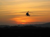 Swansea Airport, Swansea, Wales United Kingdom (EGFH) - Arriving at dusk - by Roger Winser