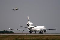 Leipzig/Halle Airport, Leipzig/Halle Germany (EDDP) - The giant and the flea at rwy 26R. - by Holger Zengler