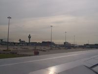 Amsterdam Schiphol Airport, Haarlemmermeer, near Amsterdam Netherlands (EHAM) - Wingshot from a B767.   - by J.B. Barbour