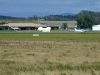 Devonport Airport - Devonport (YDPO) looking SW across runway 06-24 and the Terminal building on the left - by Anton von Sierakowski