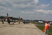 Wittman Regional Airport (OSH) - Mustangs N451MG and N151MW going out to play. - by Timothy Aanerud