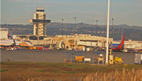 Metropolitan Oakland International Airport (OAK) - Terminal 1 from arriving Southwest 737 - by Steve Nation