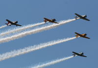 Willow Run Airport (YIP) - T-6s in formation with a single BT-13 - by Florida Metal