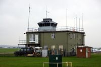 Duxford Airport, Cambridge, England United Kingdom (EGSU) - Controletower as seen from the TFc hangar. - by Robert Roggeman