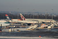 Manchester Airport, Manchester, England United Kingdom (EGCC) - Qatar B777 A7-BAG and US Airway A330 N277AY, both diverted into MAN due to the severe weather at Heathrow and Gatwick - by Chris Hall