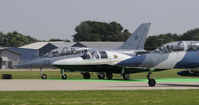Wittman Regional Airport (OSH) - Departing three at a time - by Todd Royer