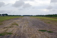 Eua Airport - Runway at 'Eua, terminal to the left - by Micha Lueck